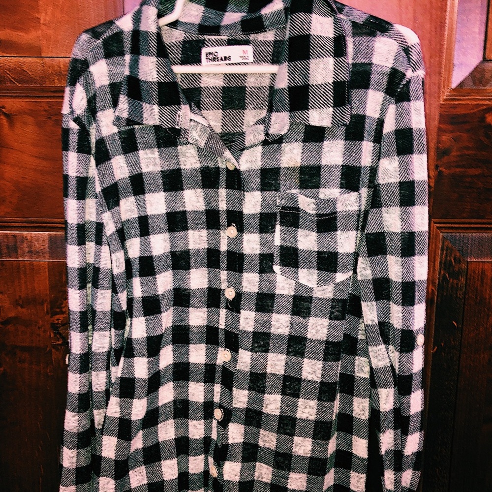 Black and white plaid button down. CHILD.